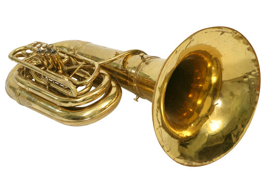 Wind musical instrument tuba on a white background