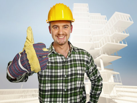 smiling handyman and building background
