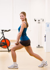 Woman exercising in health club