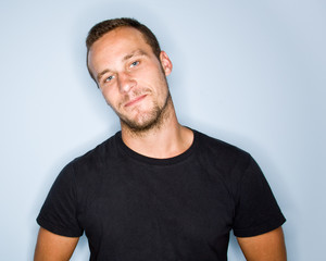 Serious man with beard