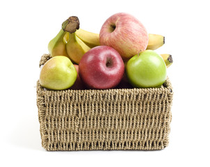 Fresh and ripe fruits in a grass crate
