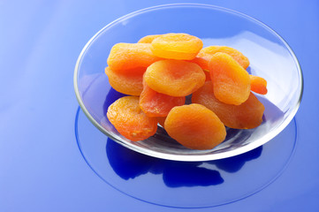Dried apricots on plate