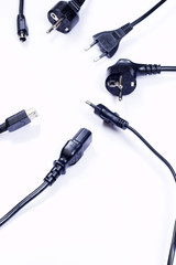Power cord connectors over white background