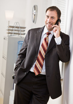Businessman talking on cell phone
