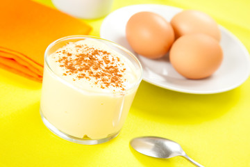 tasty bowl glass of gustard pudding