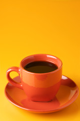 Terracotta cup of coffee