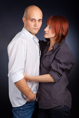Attractive Couple against a Black Background
