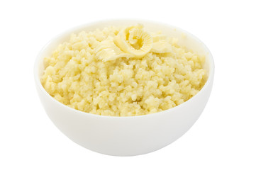 Millet porridge decorated with butter isolated