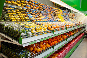 Shelf with fruits, TMs removed, price tags contain no copyright.