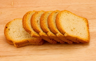 Bread slices on the wooden