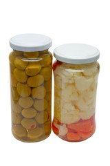 Glass jars with marinated vegetables  isolated on the white back
