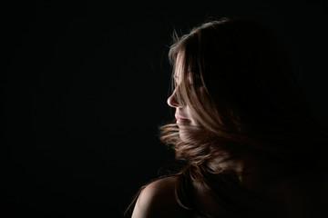 Young woman portrait on the wind