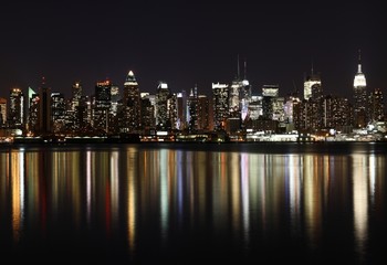 Fototapeta na wymiar Midtown (West Side) Manhattan w nocy (zdjęcie panoramiczne wykonane z