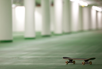 skateboard in an underground parking - perfect place for a ride.
