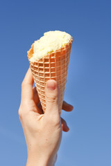 Hand holding a ice cream cone