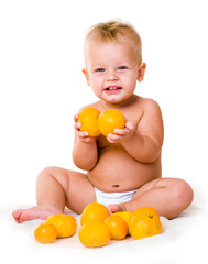 kid with oranges