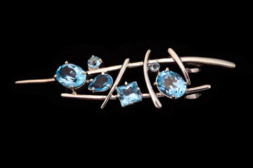 Golden jewelry  with blue topaz