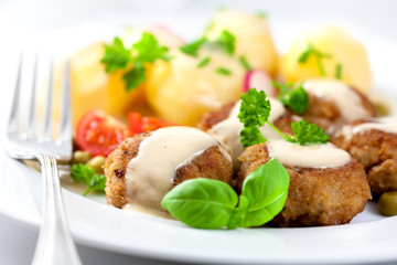 Frikadeller with potatoes and fresh herbs