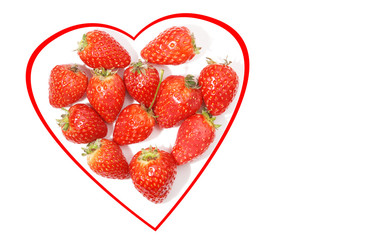Heart of strawberries on white