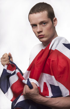 Young man wearing English flag