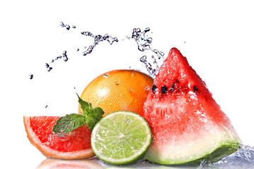 Water splash on  fresh fruits isolated on white