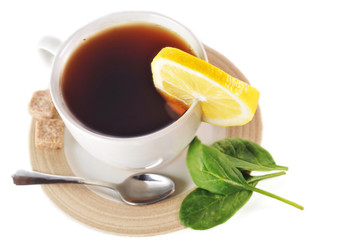 full cup of tea with lemon