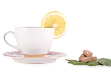 full cup of tea with lemon