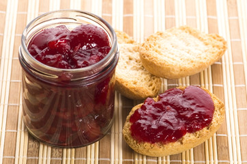 Breakfast of cherry jam on toast
