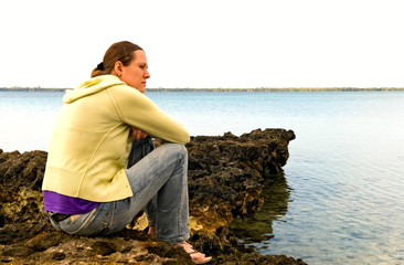 portrait of young woman on the coast