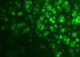 Green abstract background with shiny clovers