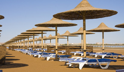 Beach on a sunny day. Hurghada city in Egypt.