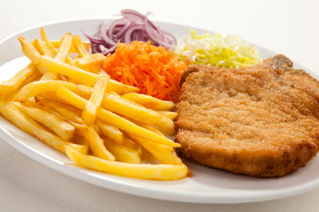 Fried pork chop with vegetables