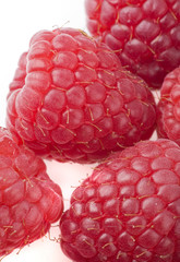 Raspberries on a white background