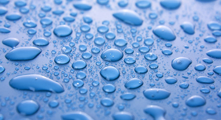 Water drops background with big and small drops