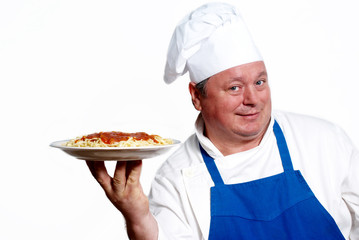 Portrait of happy attractive cook with spaghetti