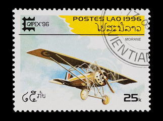 mail stamp from Laos featuring a WW1 Morane fighter
