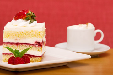 Strawberry cake with cappuccino