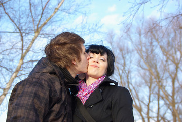 Young kissing couple
