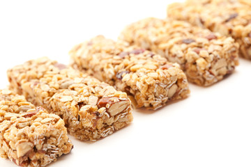 Row of Several Granola Bars Isolated on White