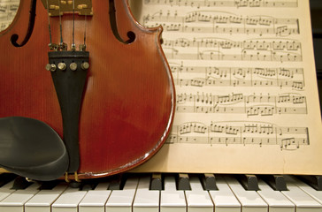 Violin Piano Keys and Music Sheets