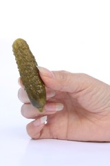 Gherkin and hand