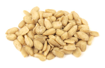 Peeled sunflower seeds isolated on white