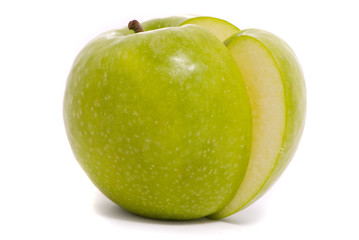 Sliced green ripe apple isolated on white background