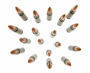 Set of kalashnikov cartridges standing on white background