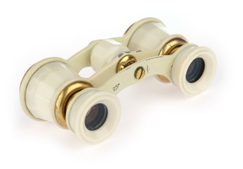 old opera glasses on a white