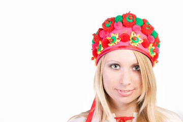 Portrait of a pretty blonde in a national cap