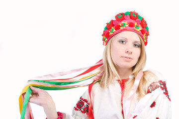 Portrait of a pretty blonde in a national cap