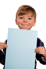 Boy holding a blank