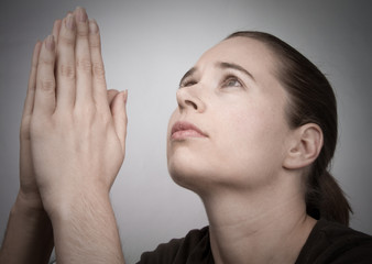 Young woman praying - 21199272