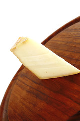 light edam cheese on wood
